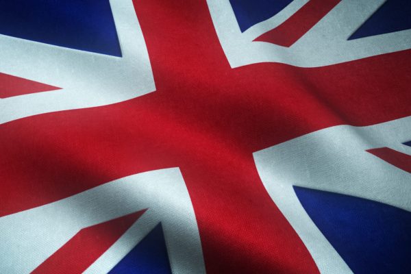 A closeup shot of the realistic flag of the United Kingdom with interesting textures